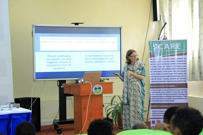 Professor Barbara presenting on the emission of greenhouse gases from onsite sanitation facilities